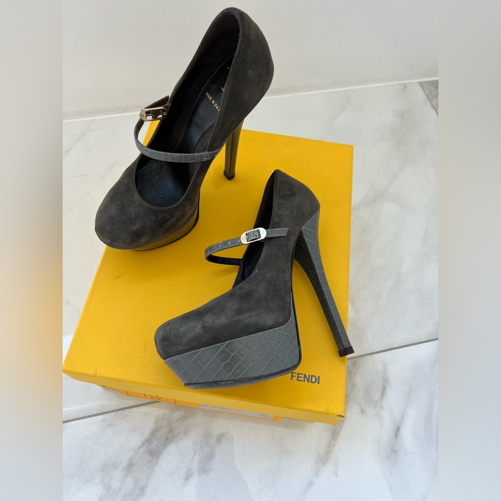 Fendi pumps like new, dust bag, extra heel, and box included.